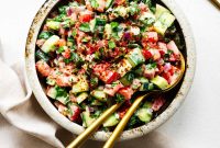 Tomato Cucumber Salad with Creamy Tahini Dressing