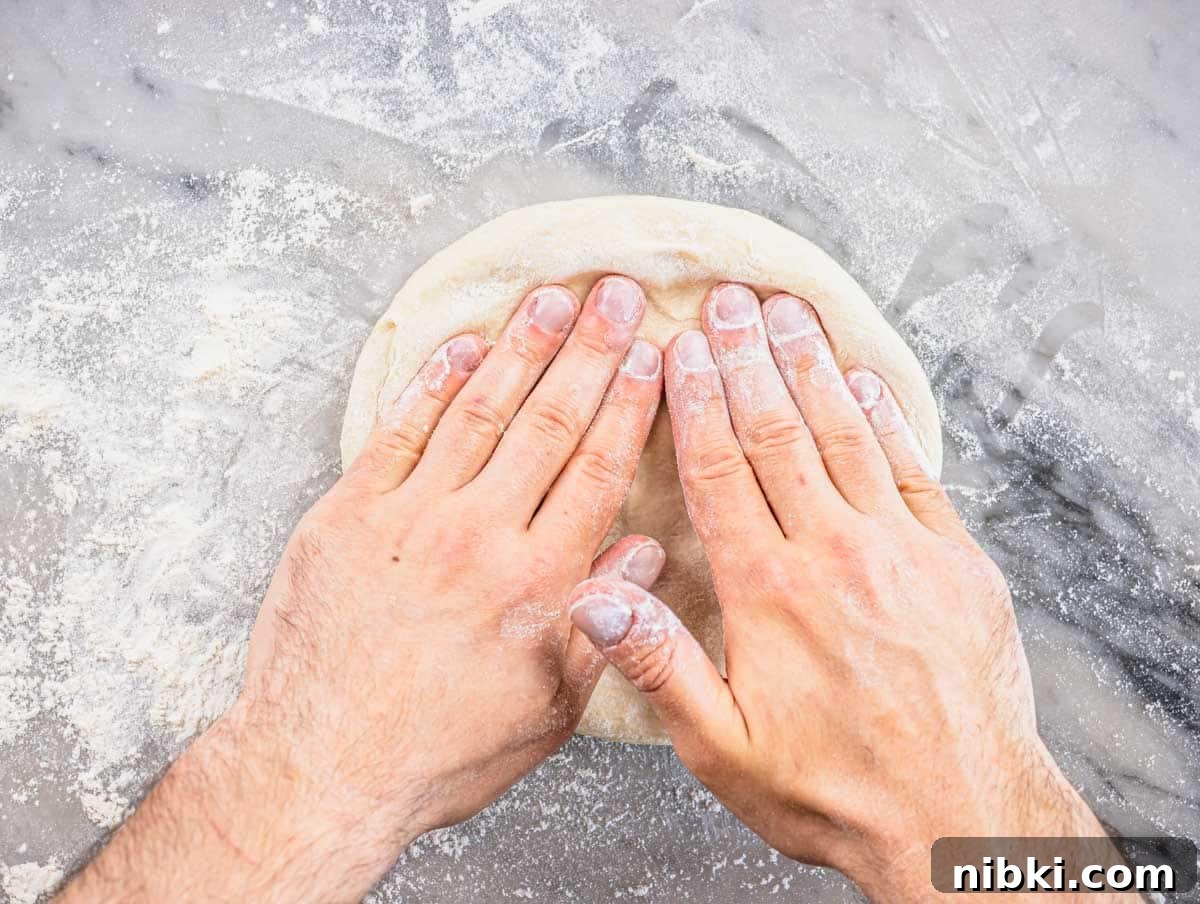 stretching the dough by hand
