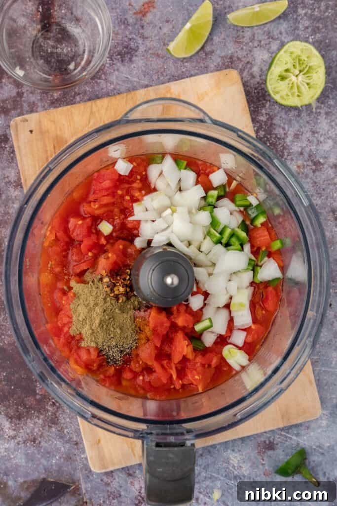 Copycat Restaurant-Style Salsa Recipe 4 making salsa in a food processor