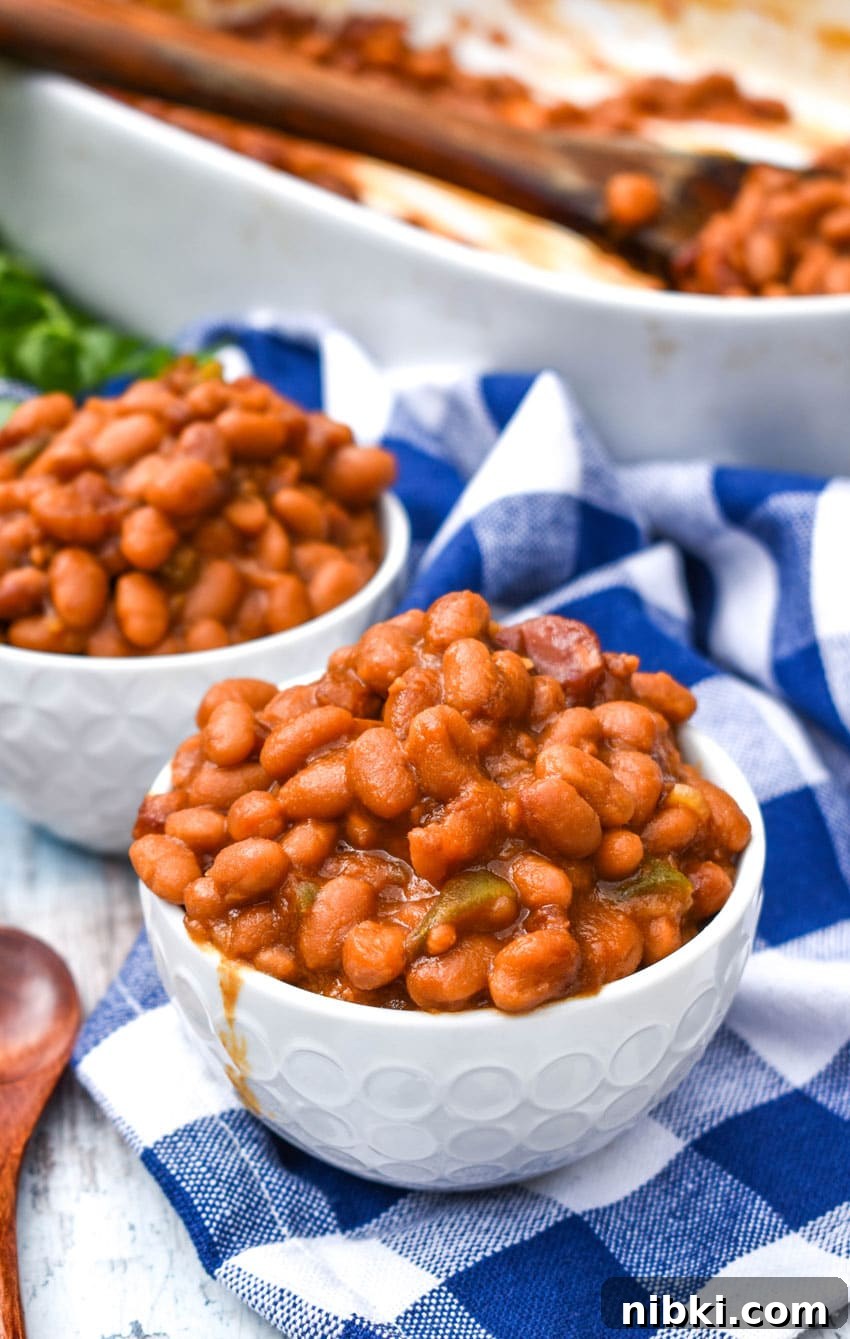 the best canned baked beans in two small white bowls