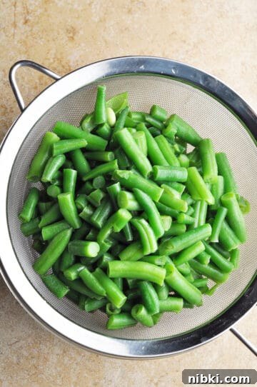 Creamy Slow Cooker Green Bean Casserole with Bacon 4 Step 1 rinse frozen green beans