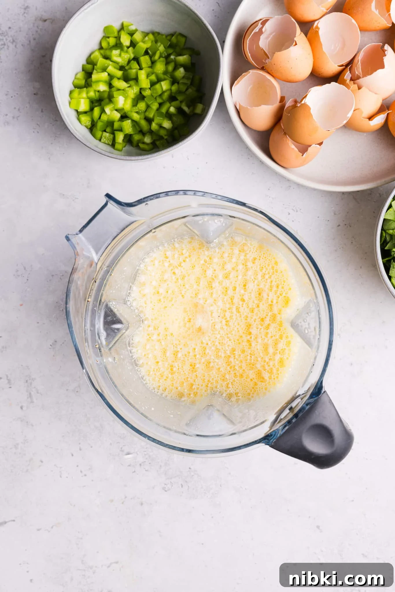 Sheet pan eggs in a food processor.