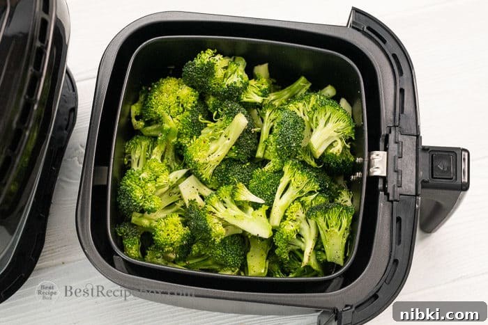 Crispy Air Fryer Broccoli Recipe 7 Transfer seasoned broccoli to air fryer basket