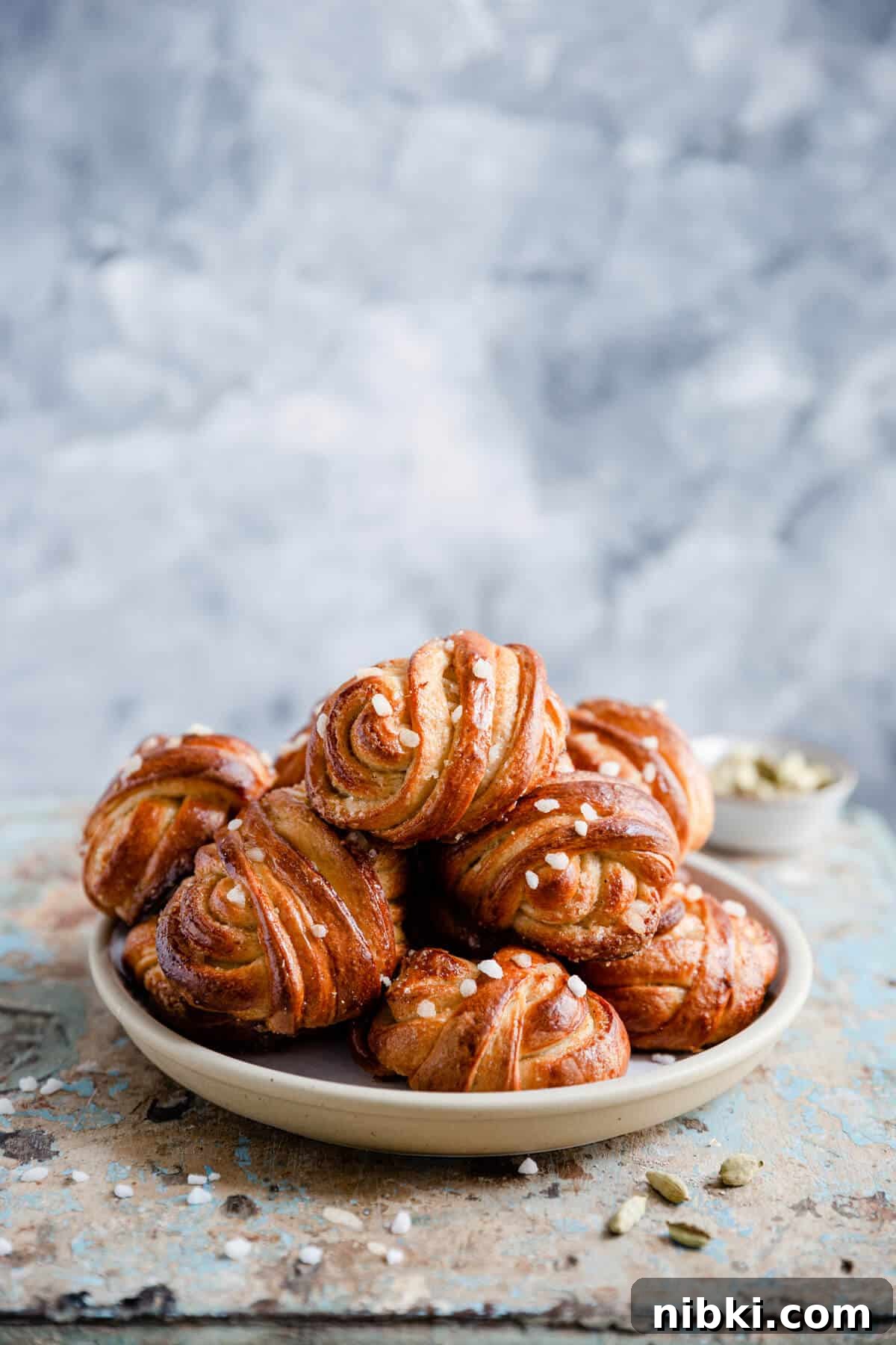 side shot of a plate with cardamom buns