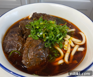 Authentic Taiwanese Beef Noodle Soup Recipe 16 Assembled beef noodle bowl
