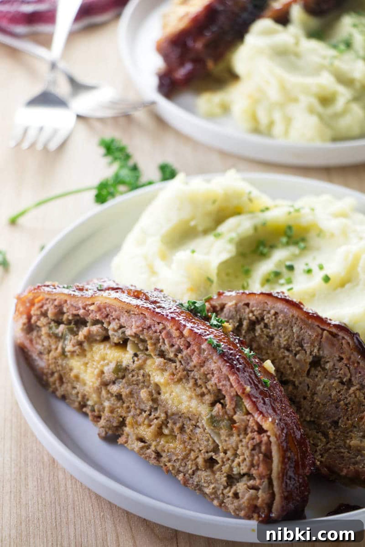 Smoked Meatloaf Recipe with Brown Sugar Glaze 14 Plate of smoked meatloaf and mashed potatoes.