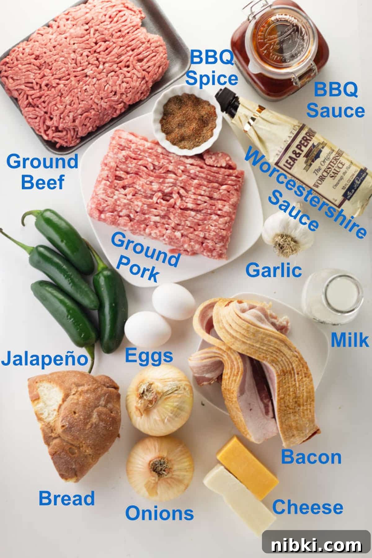 Smoked Meatloaf Recipe with Brown Sugar Glaze 4 Beef, pork, bbq sauce, and other ingredients on a table to make smoked meatloaf.