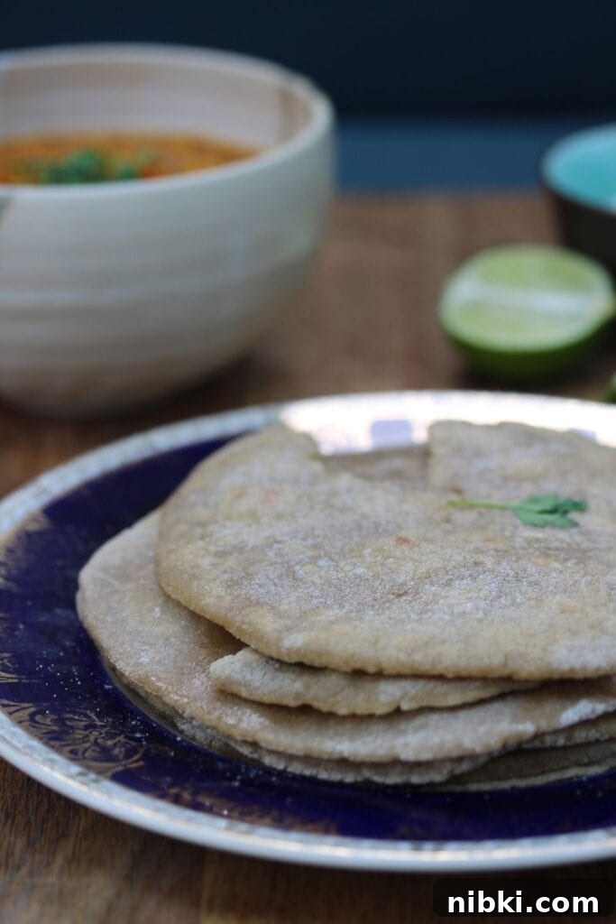 A pile of gluten free flatbreads with curry