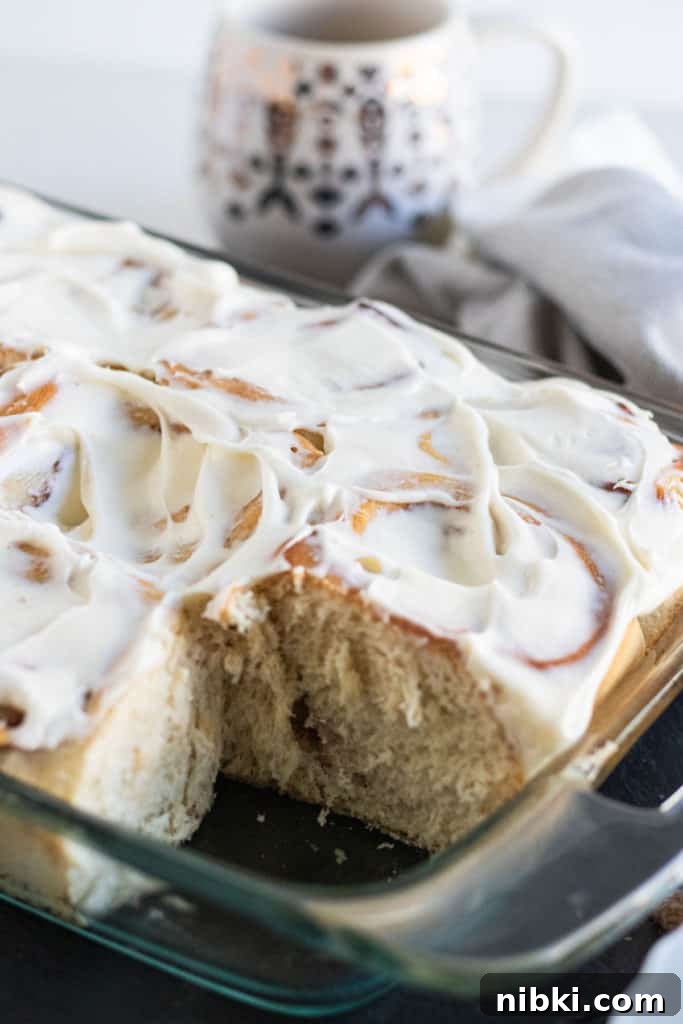 Apple Cinnamon Rolls Recipe with Brown Sugar Glaze 2 close up of a pan of apple cinnamon rolls