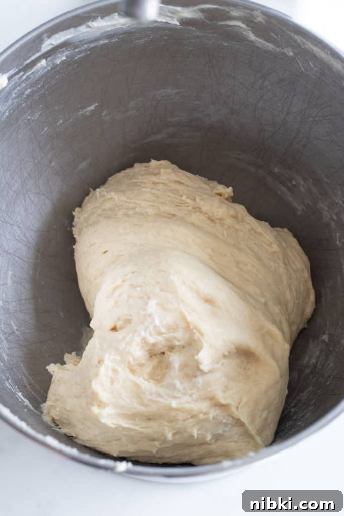 Apple Cinnamon Rolls Recipe with Brown Sugar Glaze 4 bowl of cinnamon roll dough before rising