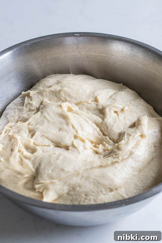 Apple Cinnamon Rolls Recipe with Brown Sugar Glaze 5 bowl of cinnamon roll dough