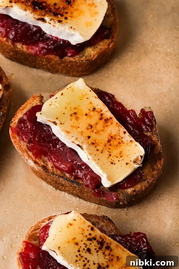 What is crostini cranberry and brûléed brie crostini on parchment paper