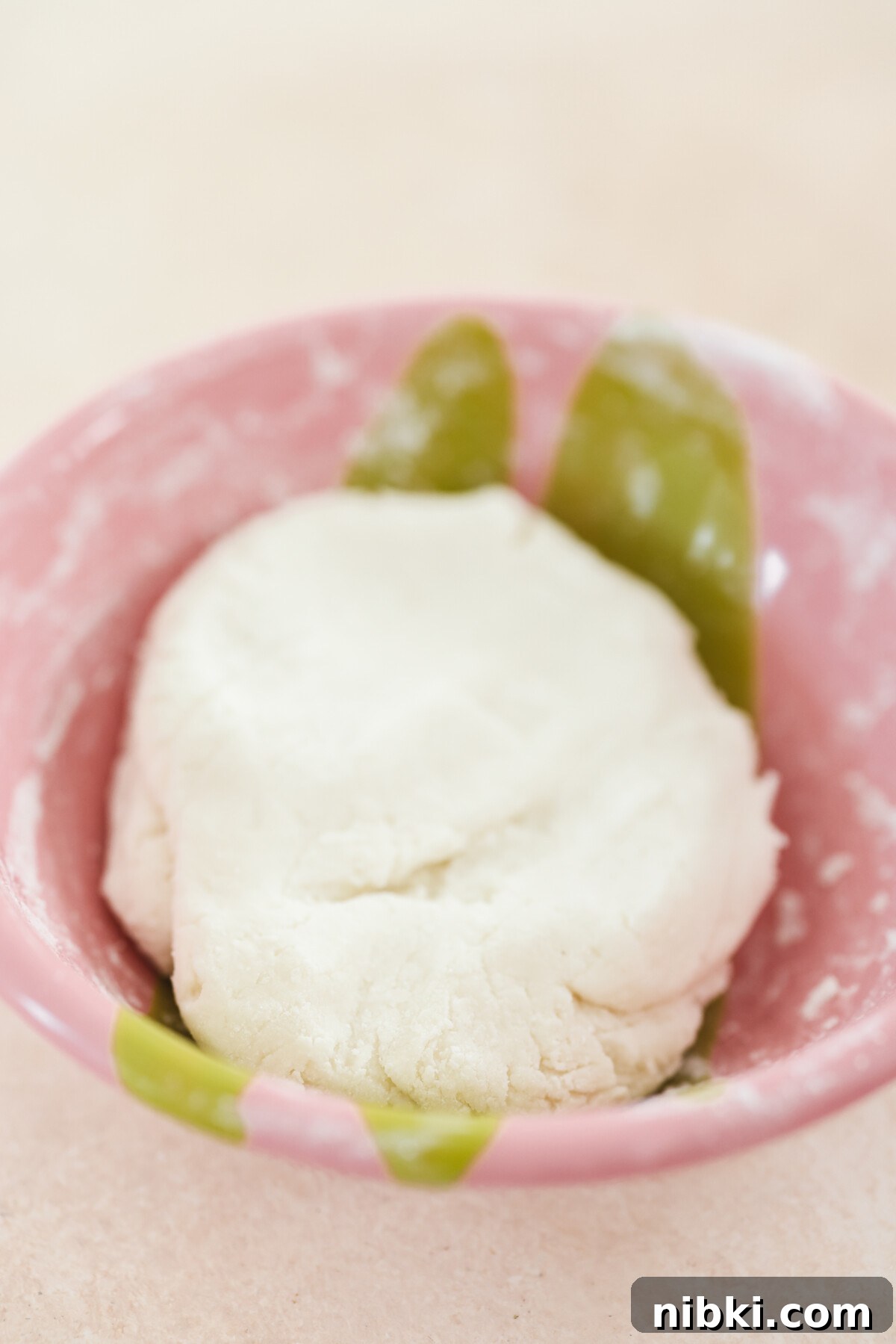 a small bowl of silver pin dough