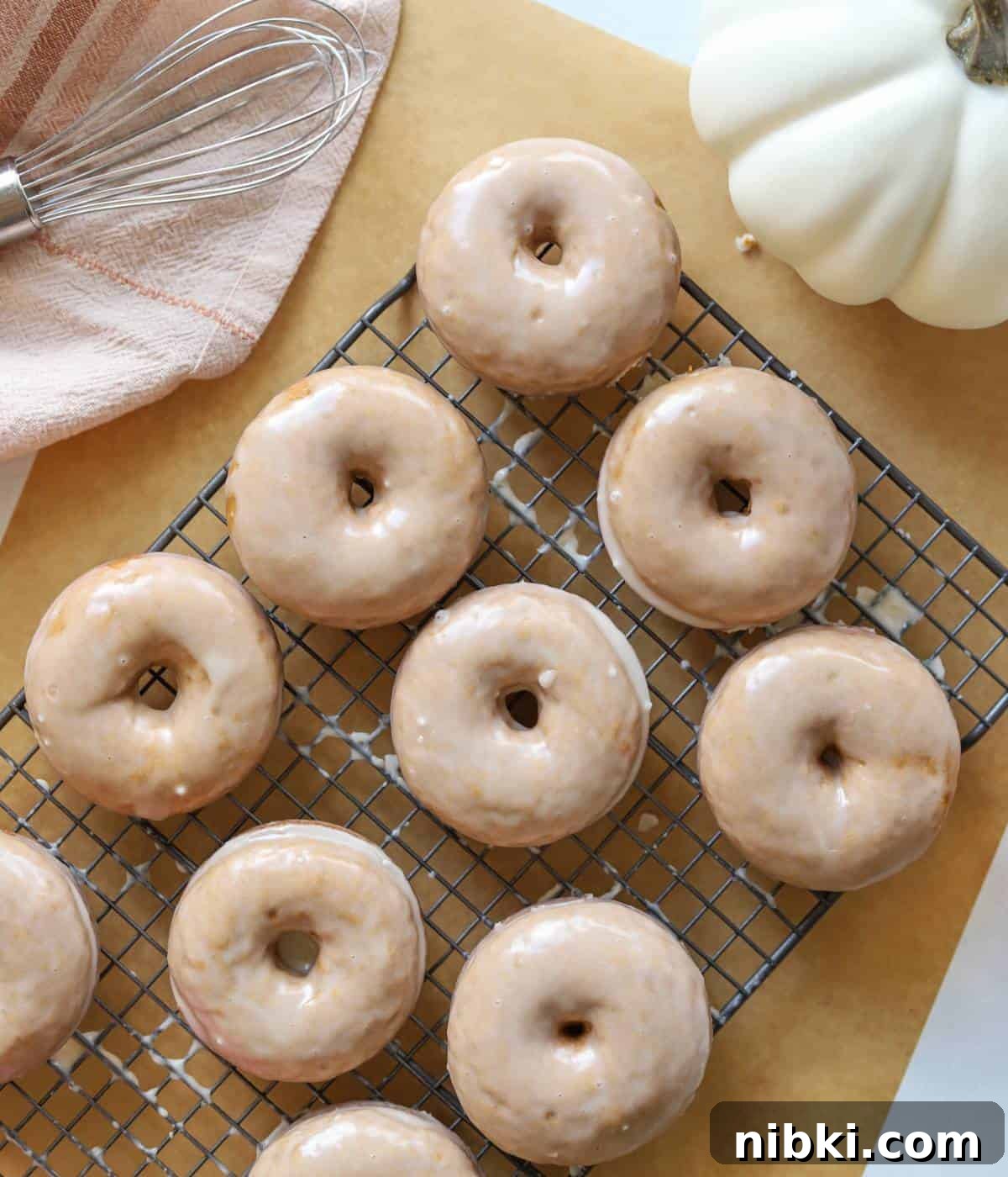 Spiced pumpkin donuts with glaze.