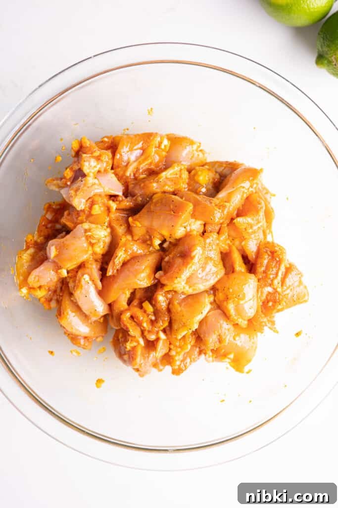 Crispy Puerto Rican Chicken Chicharrones 4 a bowl of marinated chicken
