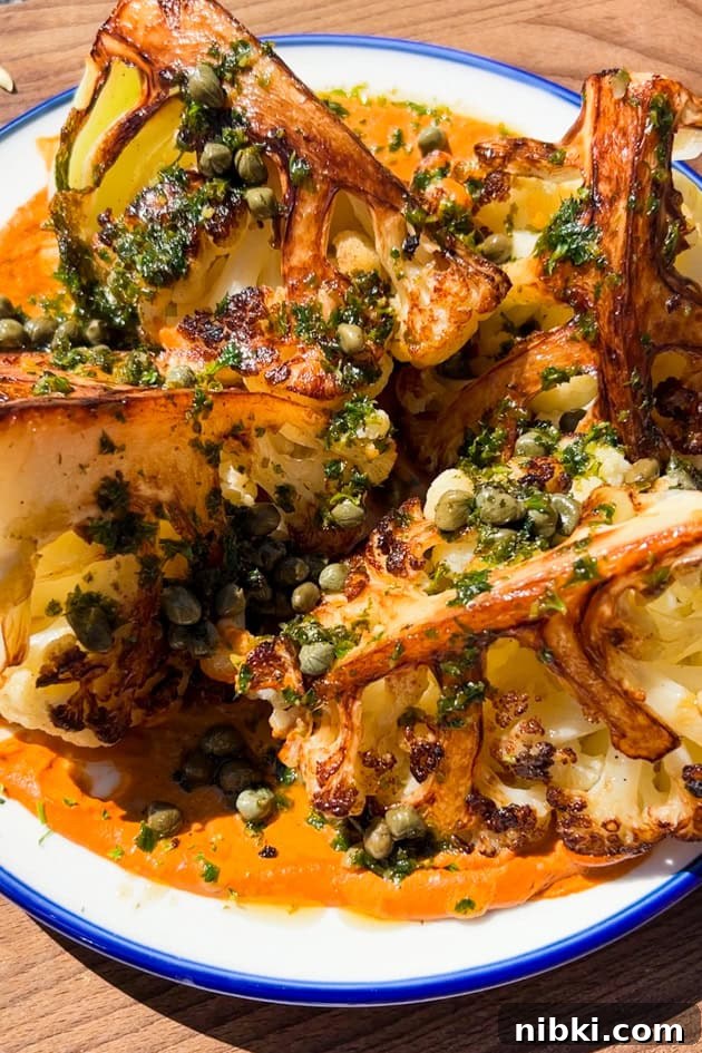 Cauliflower Steaks with Romesco Sauce and Lemon Caper Butter