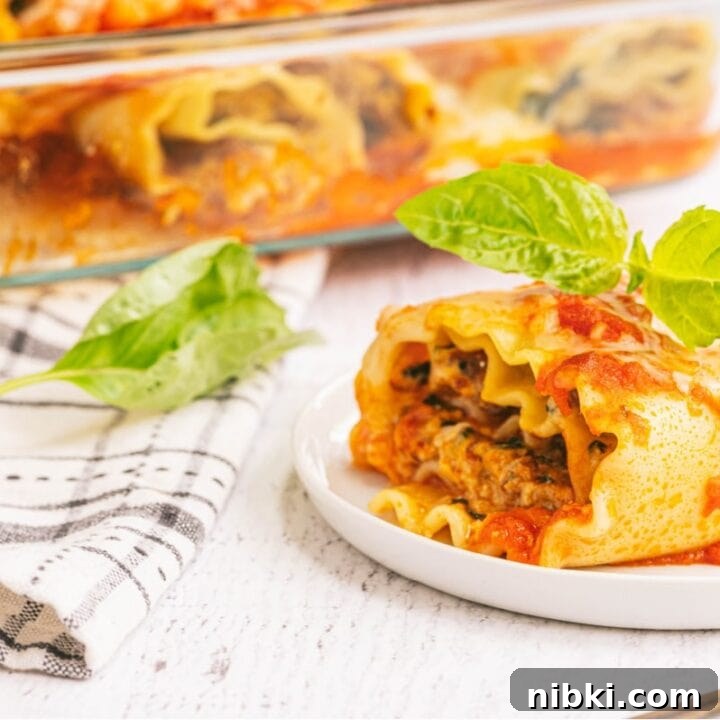 Lasagna roll ups made with spinach, chicken sausage, and cottage cheese