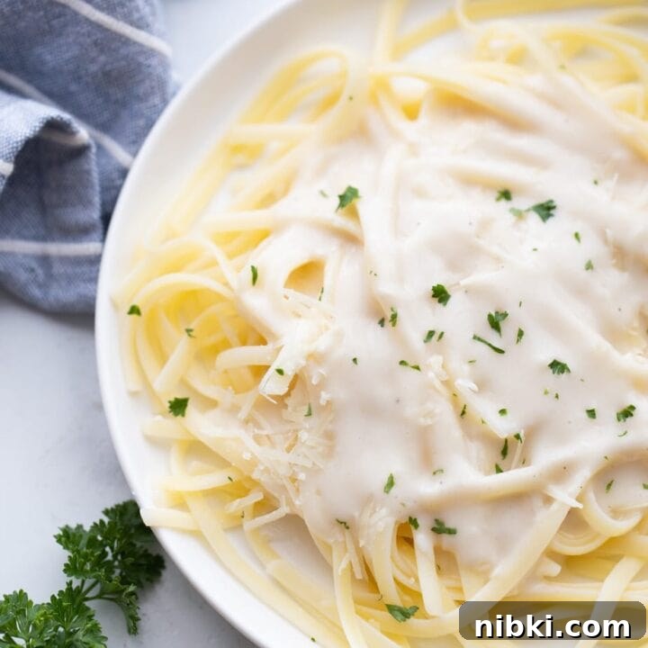 Grilled or baked chicken with broccoli and pasta with Healthy Alfredo Sauce