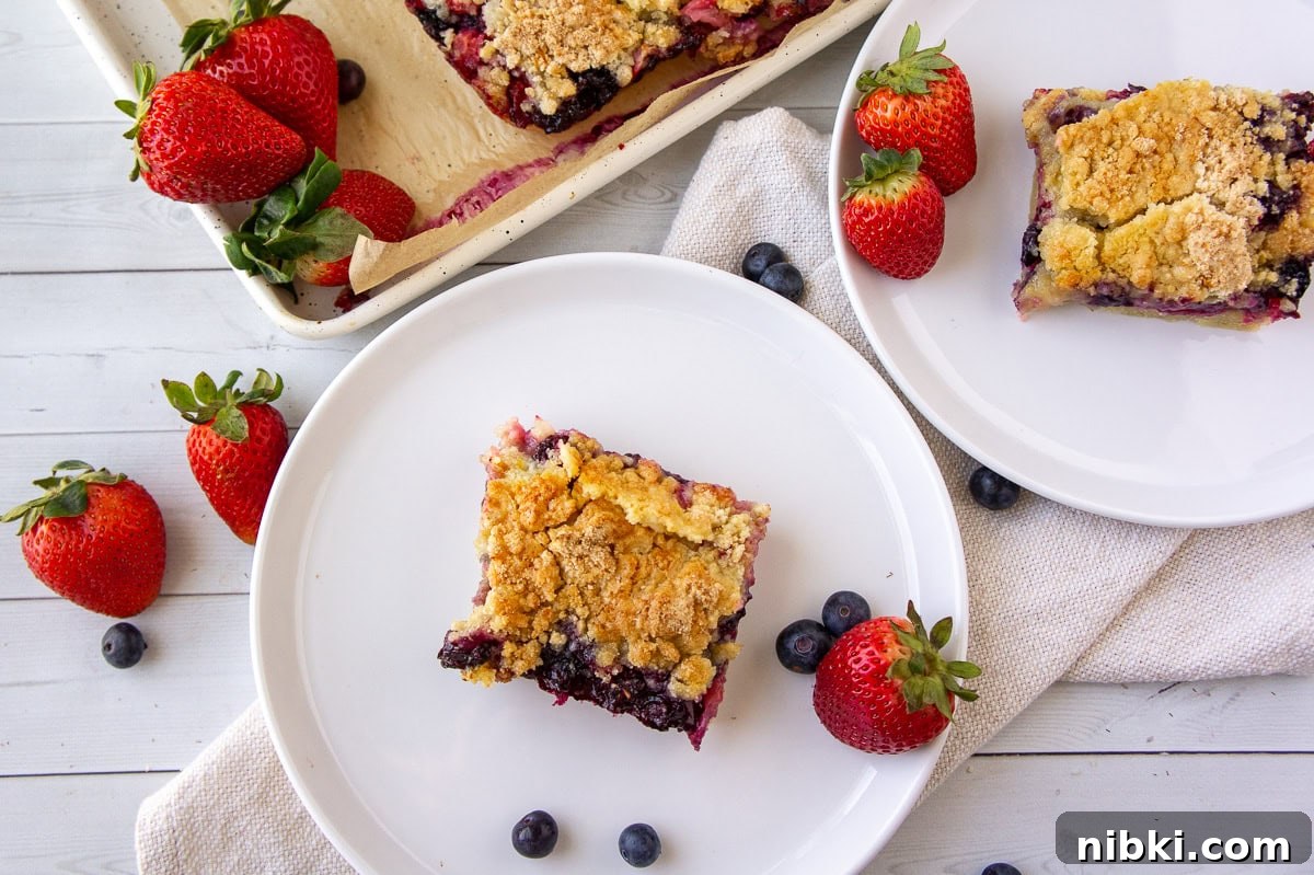 Mixed Berry Crumble Bars Recipe with Oat Streusel 8 Mixed berry cookie bars on plates