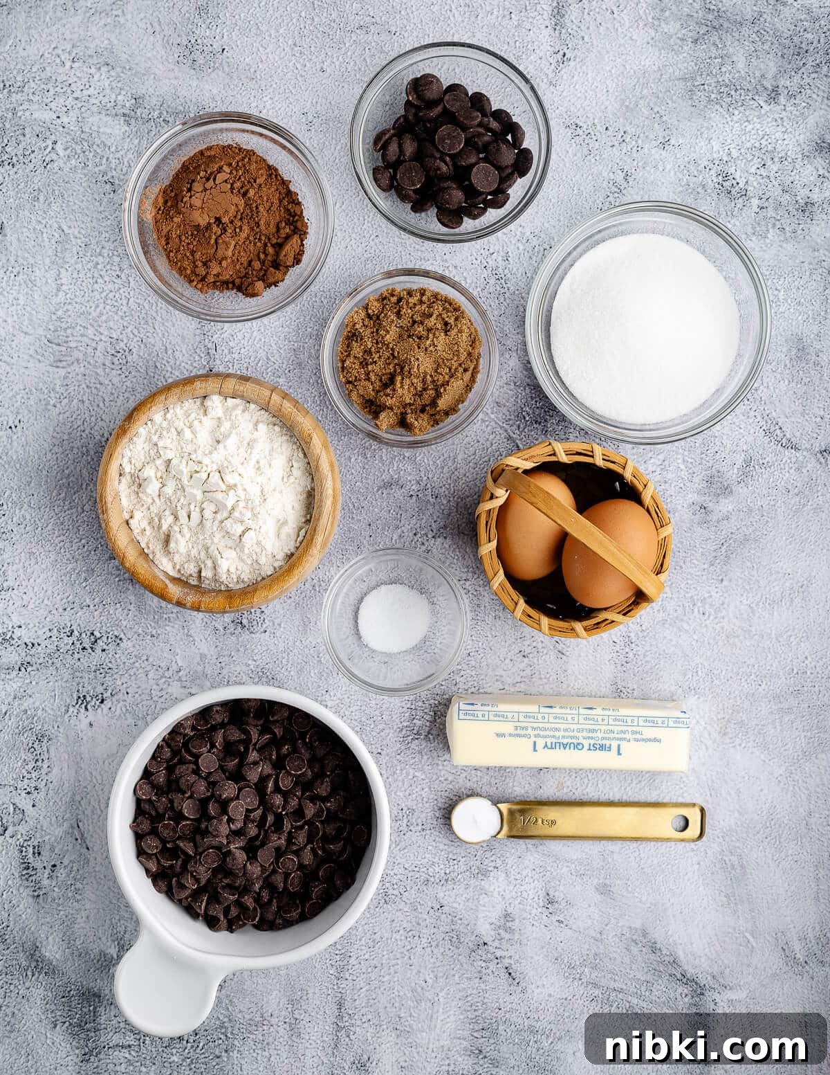dark chocolate chips, cocoa powder, sugar, brown sugar, eggs, salt, semisweet chocolate chips, butter, and baking soda.