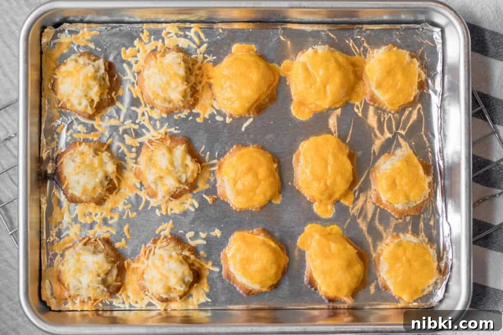 Mini Tuna Melt Bites on Crispy Crackers 6 just baked tiny tuna melts on a sheet pan