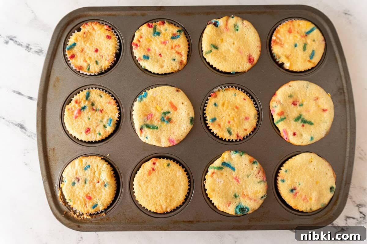 cupcakes baked and still in cupcake pan.