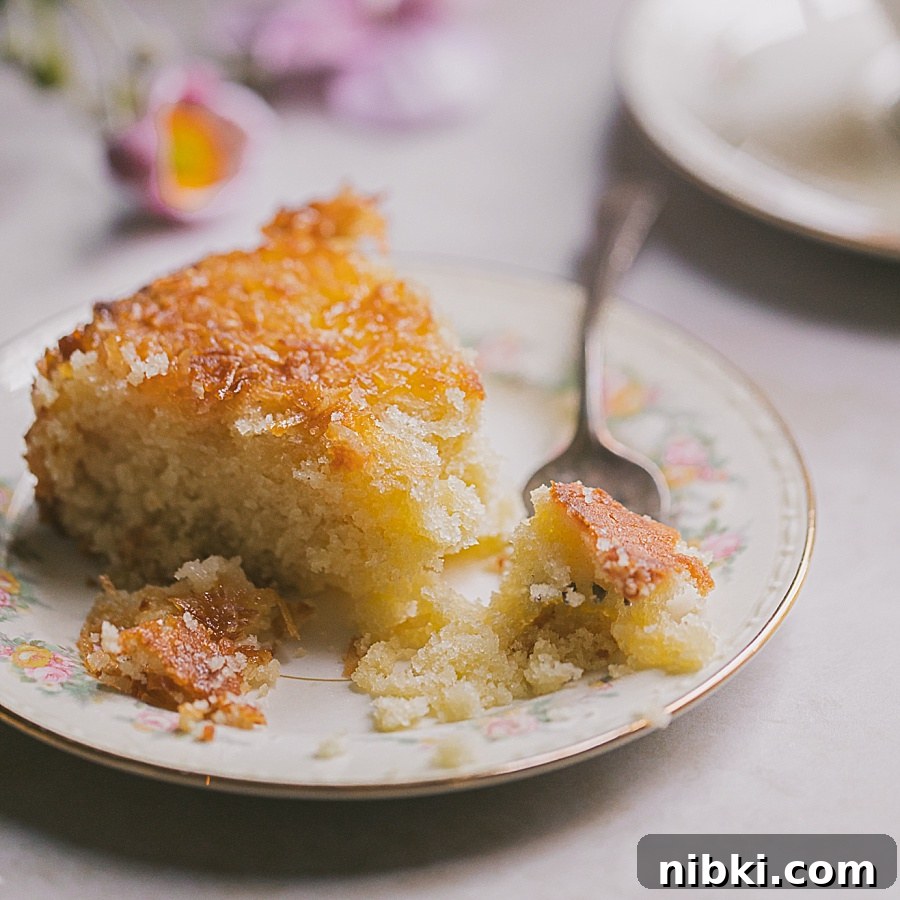 slice of tender moist pineapple coconut cake