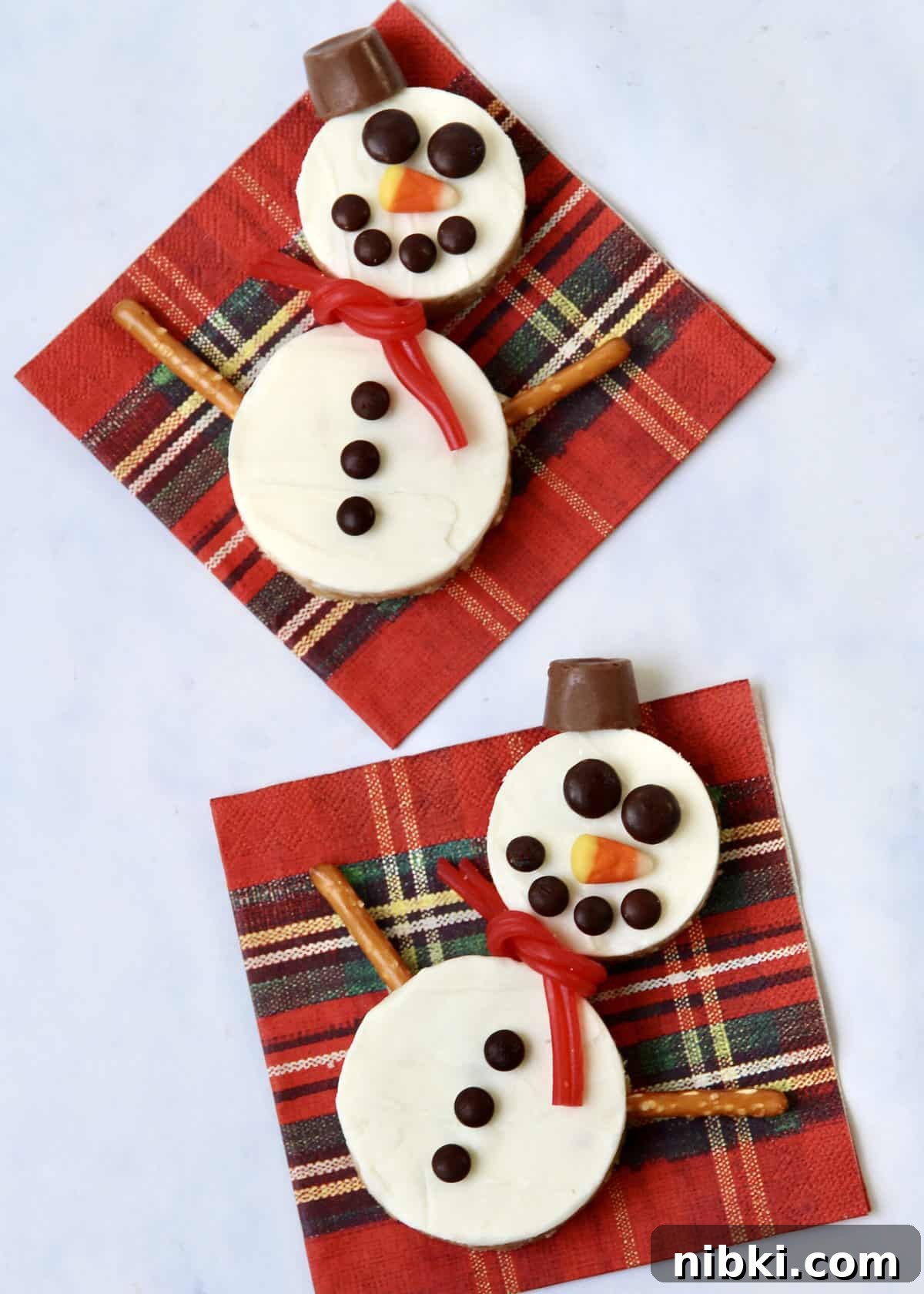 Holiday Hot Chocolate Board with Snowman Scotcheroos 3 Snowman Scotcheroos by The BakerMama