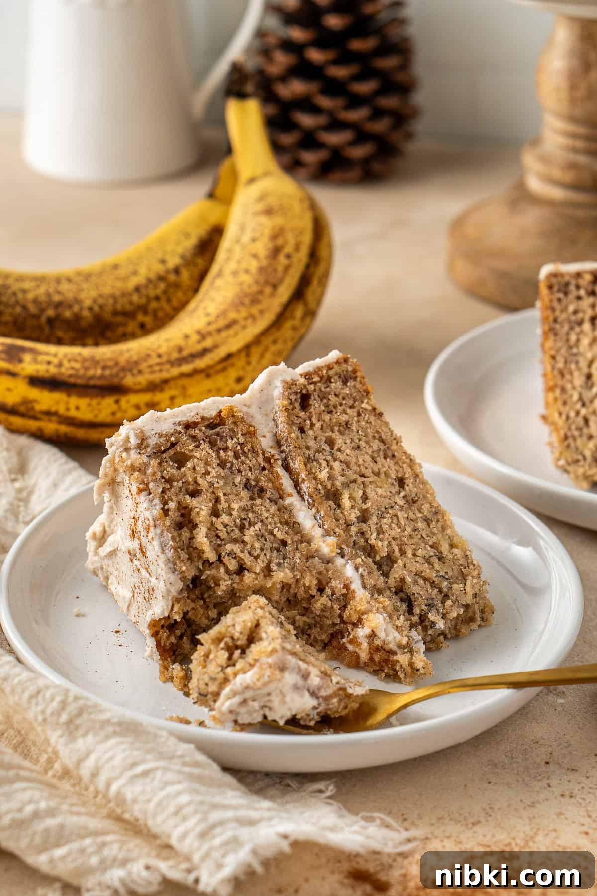 Vegan banana cake with a bite taken.