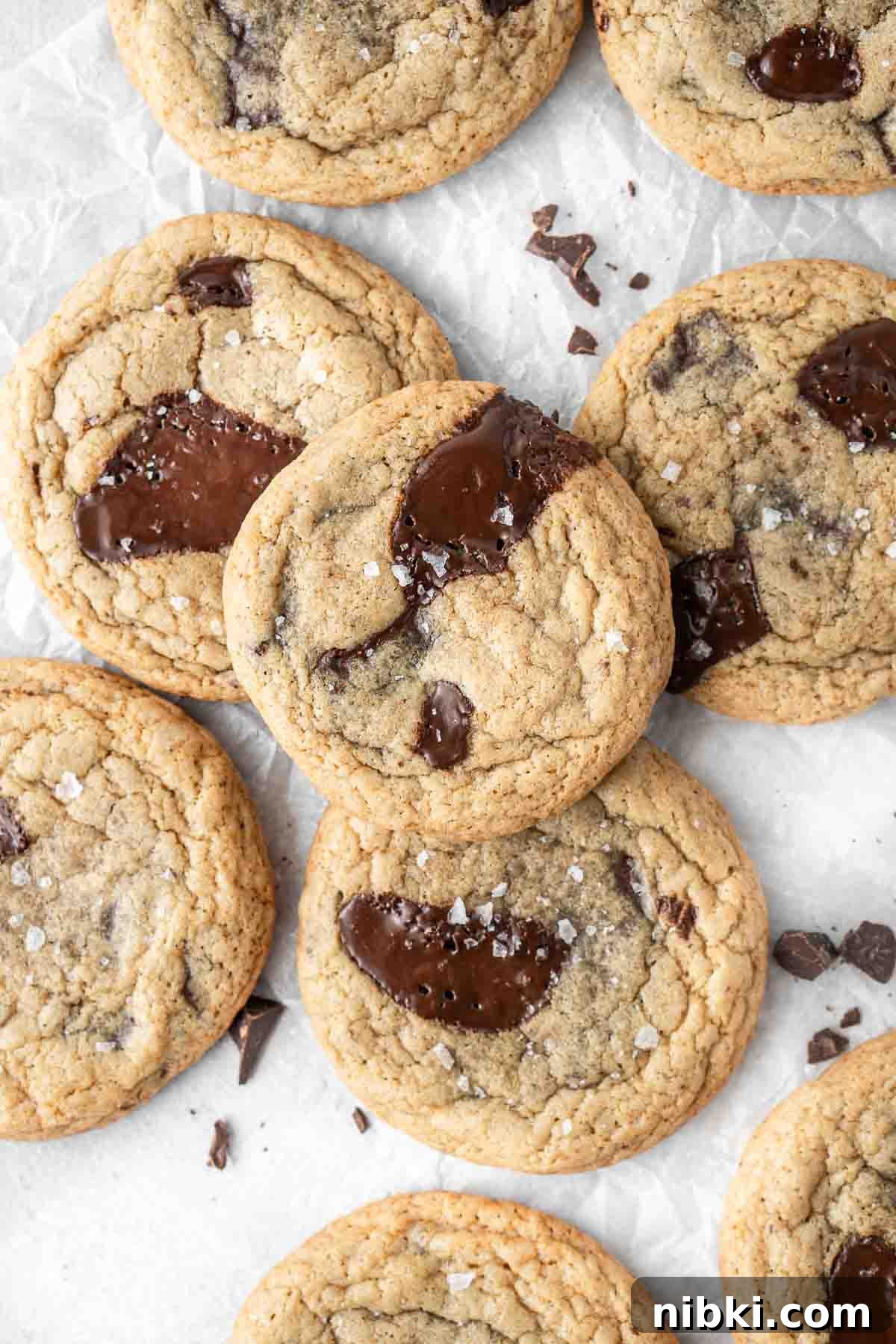 Dairy free chocolate chip cookies on a grey background.