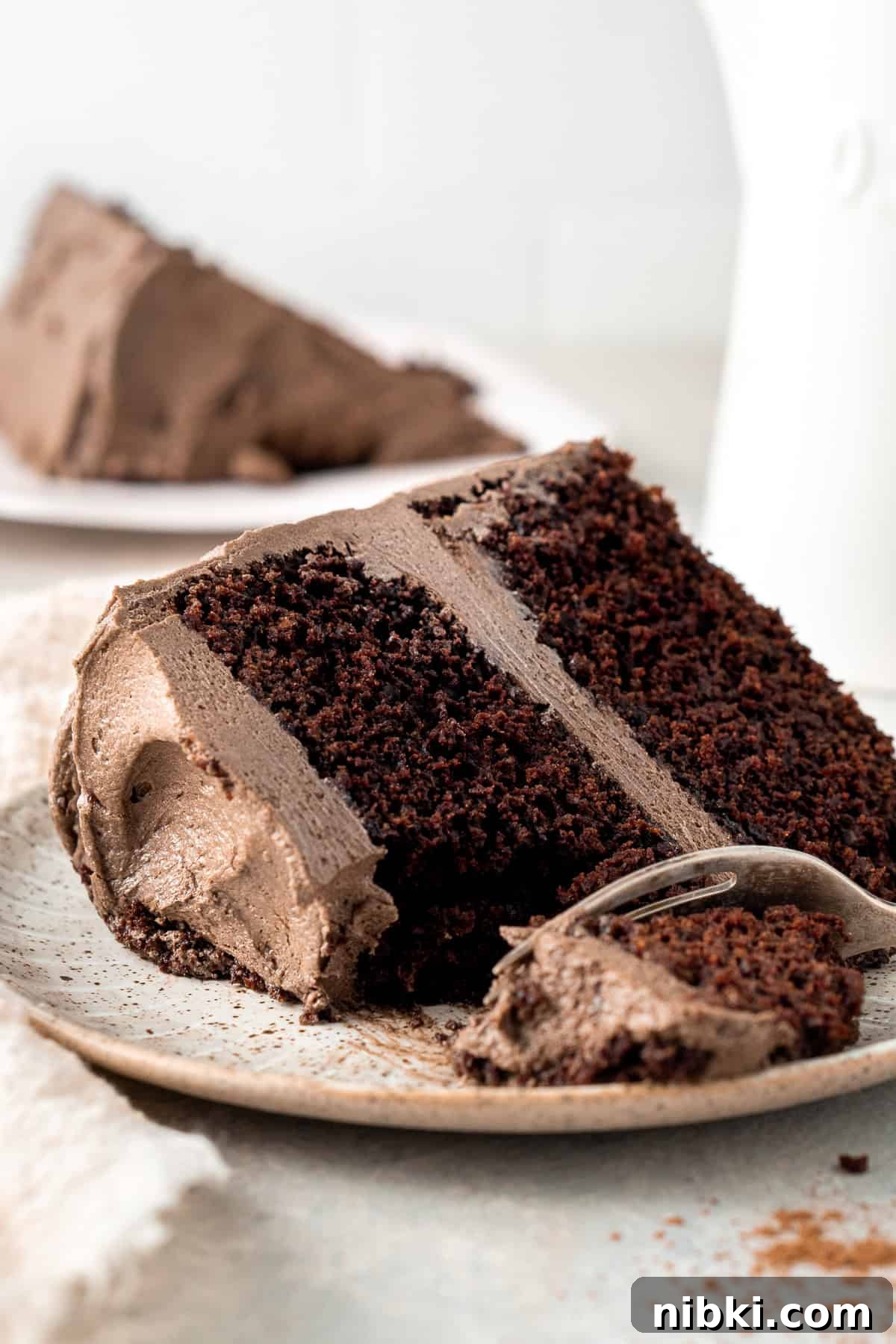 A slice of dairy free chocolate cake.