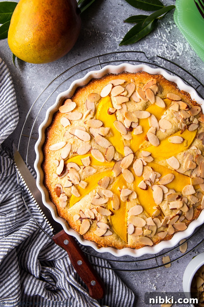 Tropical Mango Almond Cake Recipe 4 Up close overhead photo of a mango cake
