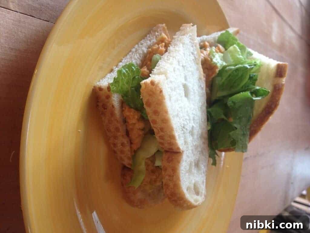 Week 1 Plant-Based Budget Challenge: Meal Plan for Two 3 Chickpea salad sandwich on a plate.