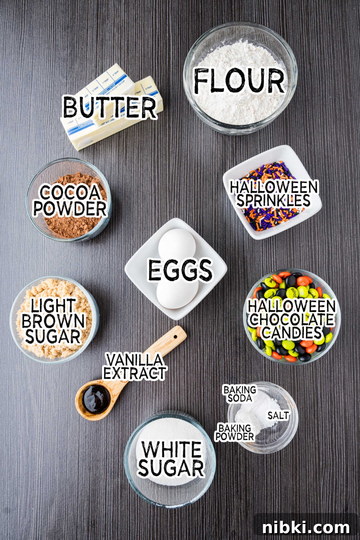 Spooky Halloween Cookie Recipes and Decorating Ideas 3 Ingredients laid out on a dark surface.