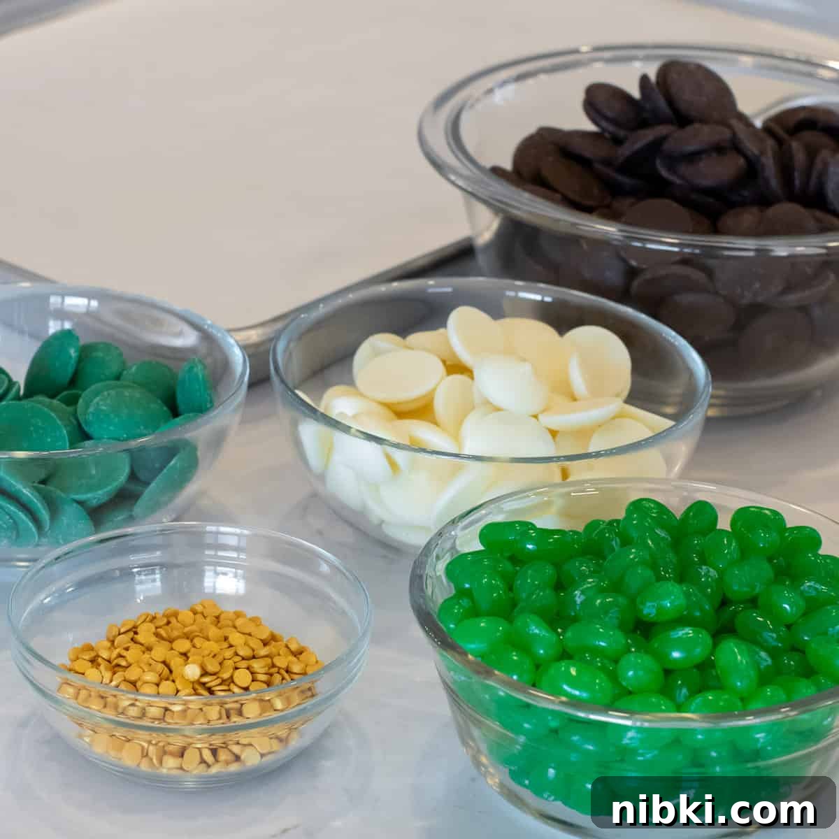St. Patrick's Day Leprechaun Chocolate Bark Recipe 3 Bowls of ingredients ready to prepare.