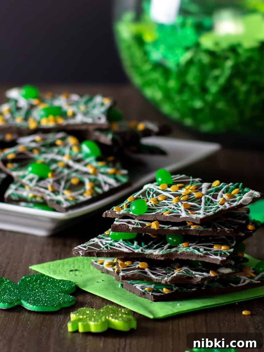 St. Patrick's Day Leprechaun Chocolate Bark Recipe 8 A tall image of chocolate piled high.