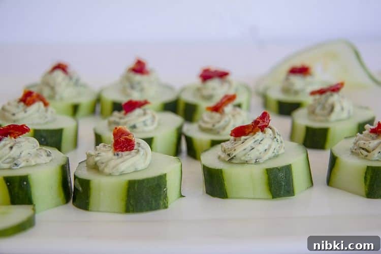 cucumber bites with basil cream cheese