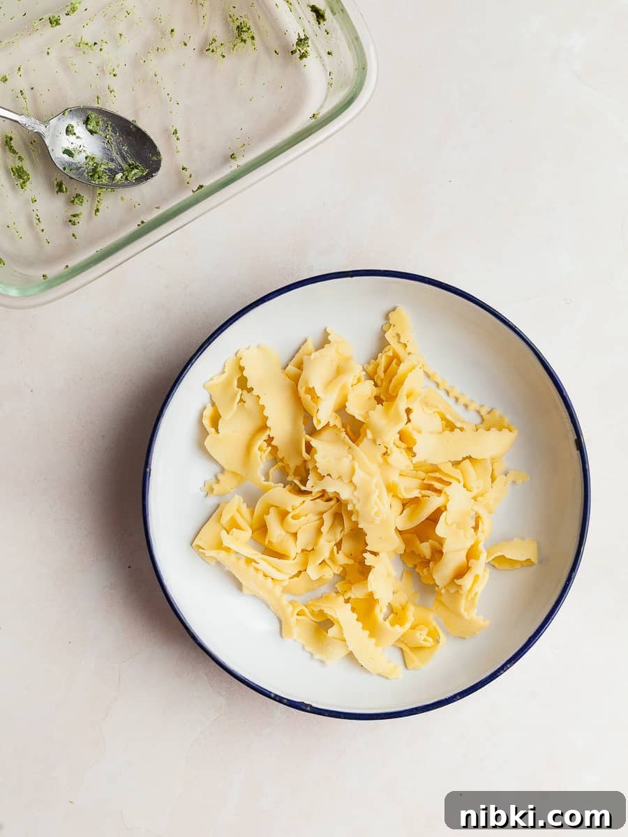Homemade Gluten-Free Spinach and Ricotta Ravioli 14 a bowl of pasta scraps