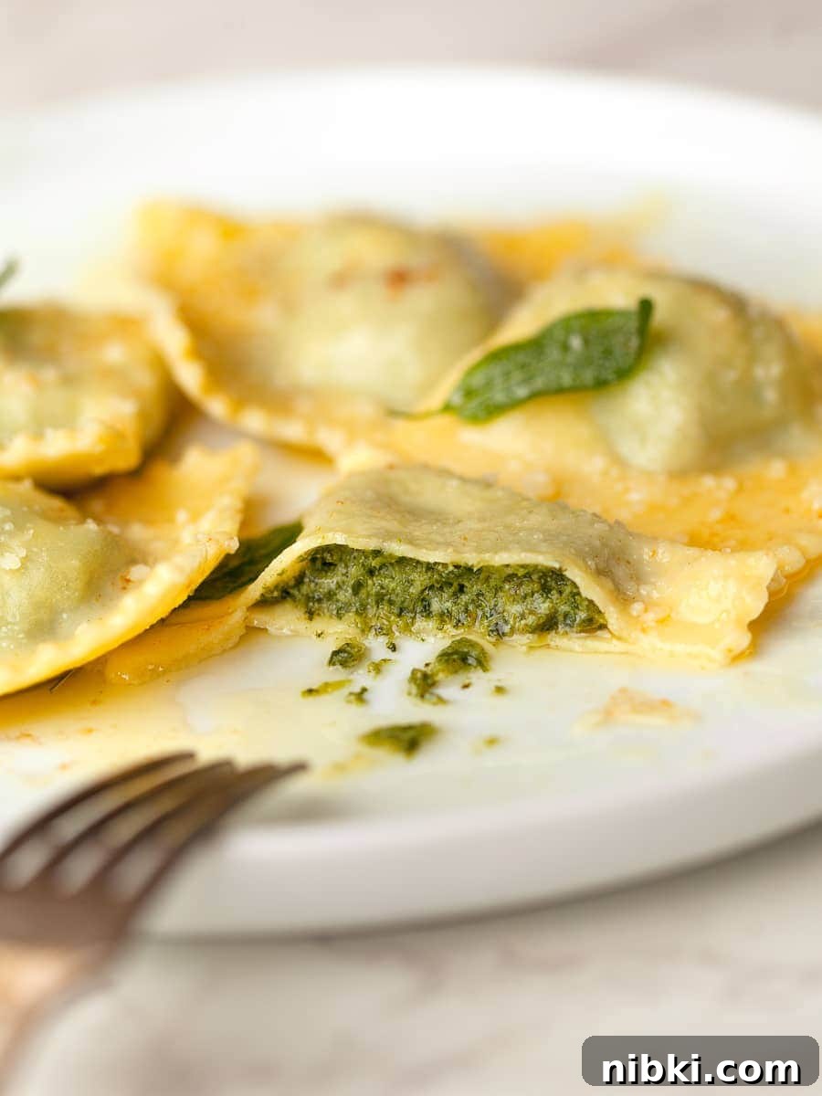 Homemade Gluten-Free Spinach and Ricotta Ravioli 15 a cut open gluten free spinach ricotta ravioli
