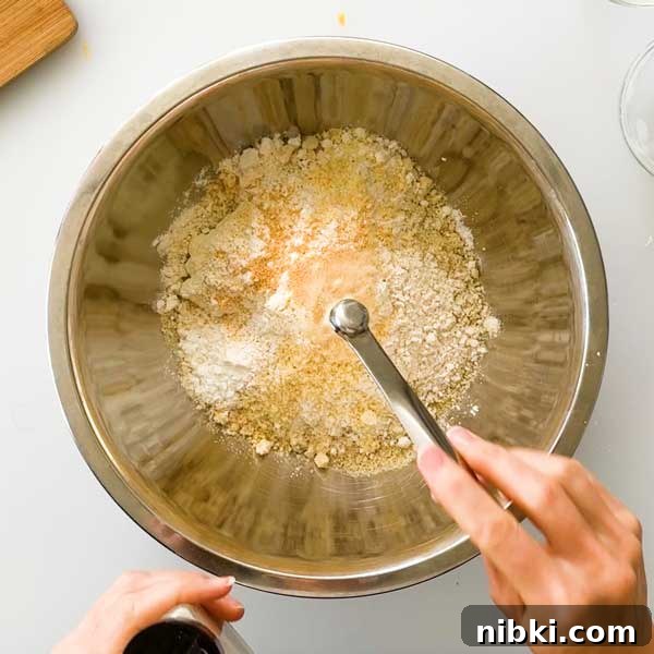 Cheddar Protein Bagels Without Yeast 4 Adding dough ingredients to a mixing bowl.