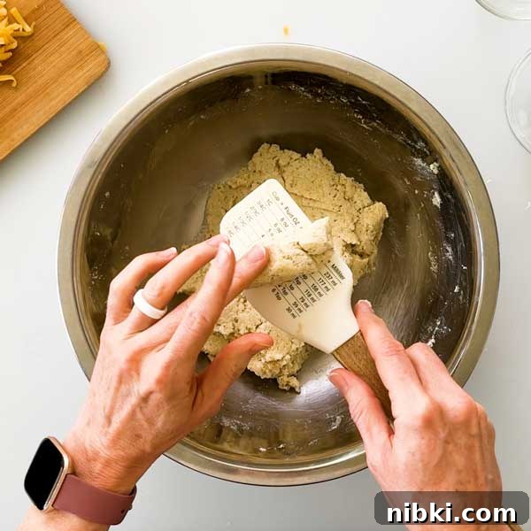 Cheddar Protein Bagels Without Yeast 5 Checking bagel dough consistency.