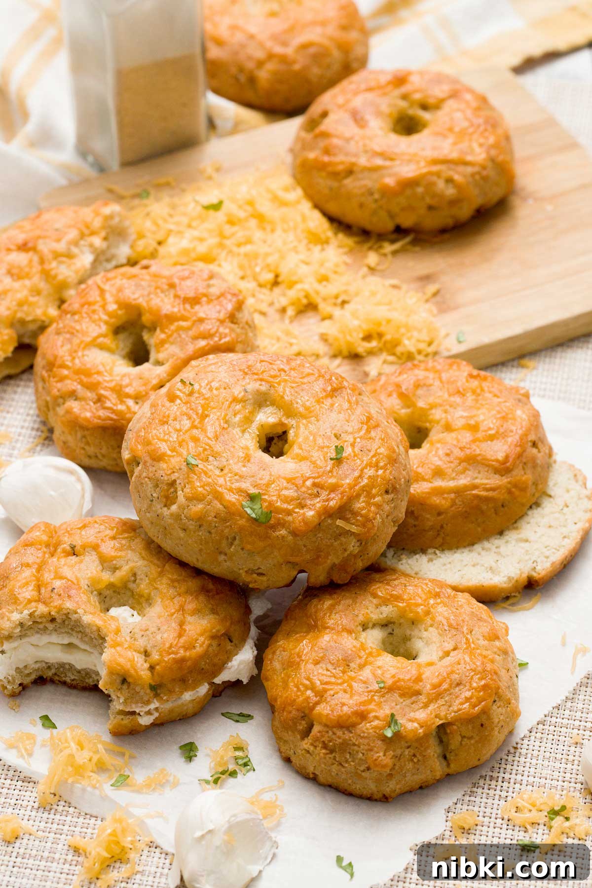 Cheddar Protein Bagels Without Yeast 9 Stack of cheddar cheese bagels.