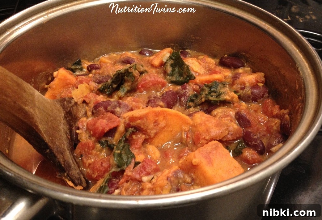 Hearty Sweet Potato and Kale Chili Recipe 3 Chunky sweet potato kale chili close-up
