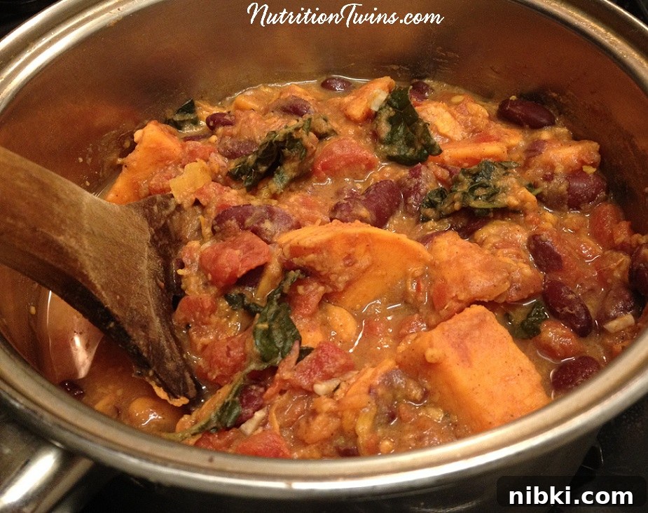 Hearty Sweet Potato and Kale Chili Recipe 4 Bowl of chunky sweet potato kale chili