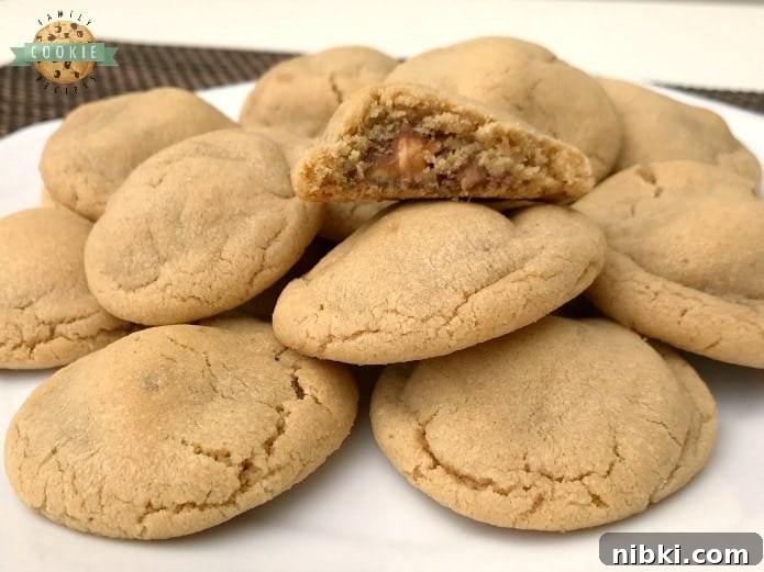 Chewy Snickers Peanut Butter Cookies Recipe 12 Snickers Peanut Butter Cookies take an already incredible soft and delicious peanut butter cookie recipe, and add a Snickers surprise in the middle!