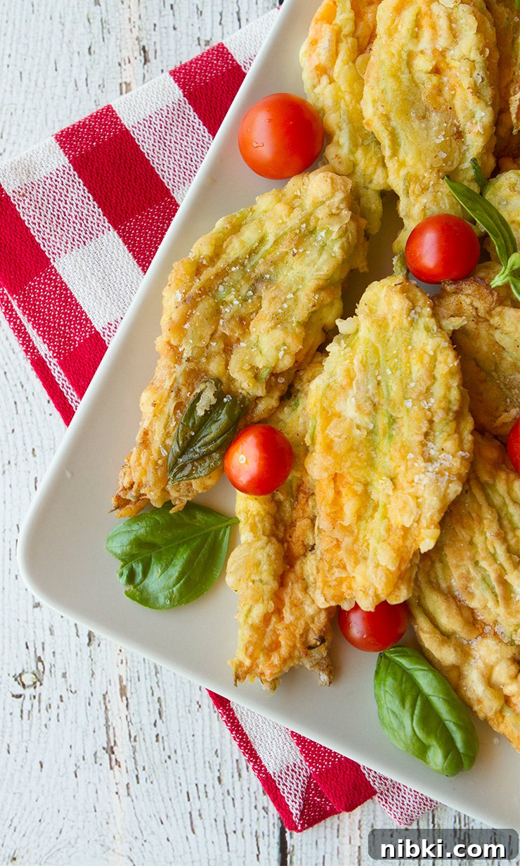 Caprese Zucchini Flowers Filled with Mozzarella and Basil 4 Caprese stuffed zucchini flowers plated