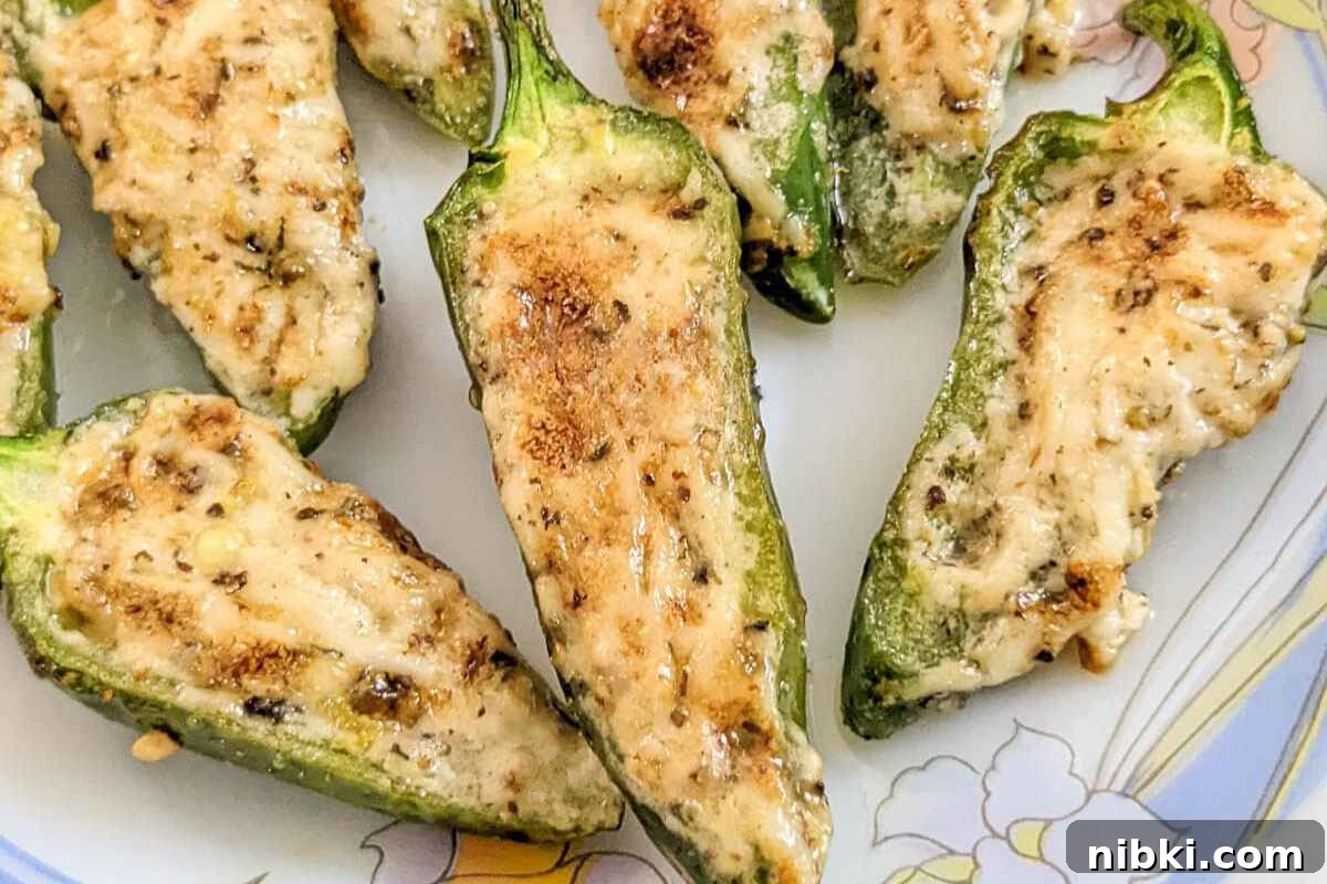 Air Fryer Vegetable Appetizers Meat Lovers Cannot Resist 2 Jalapeno poppers on a plate