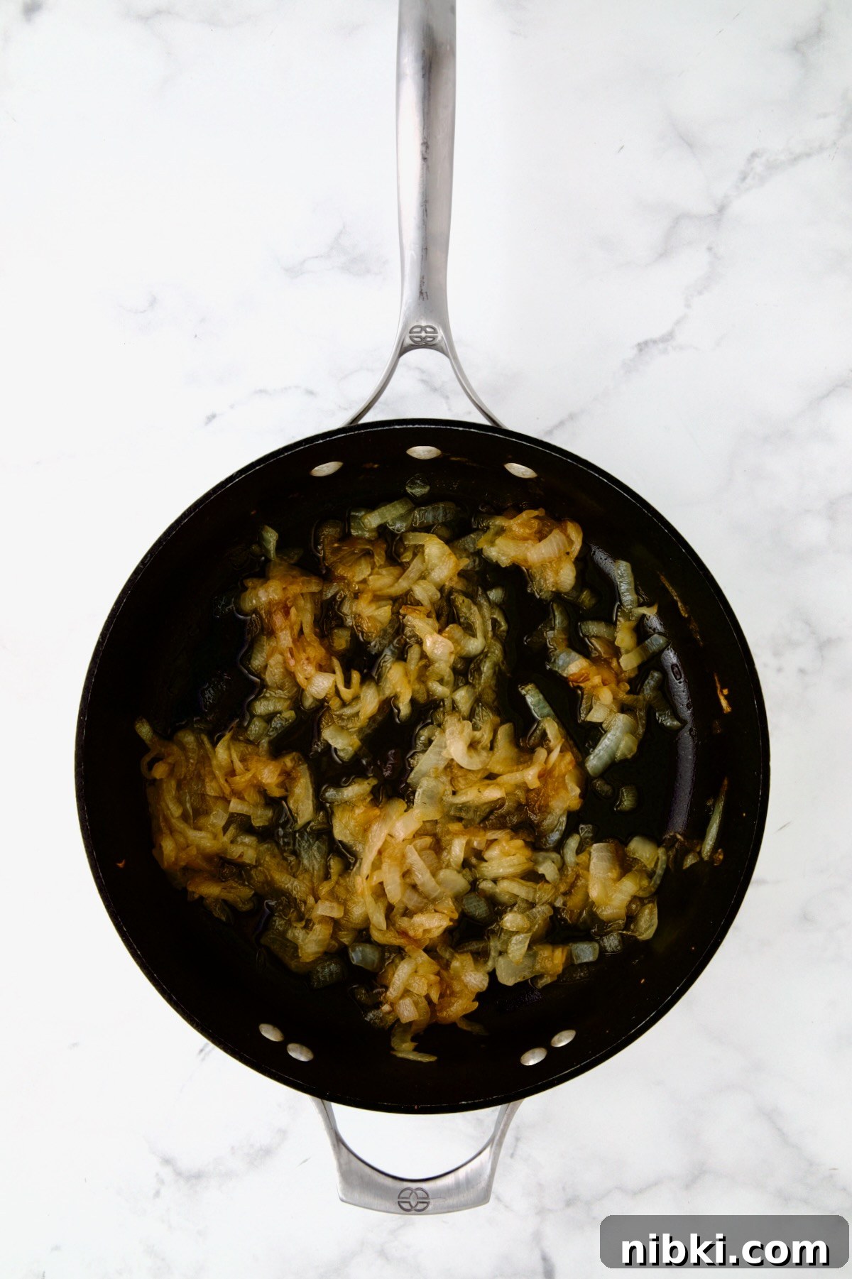 Oven-Baked Turkey Meatballs with Beer Glaze 11 Onions cooked to golden in nonstick skillet.