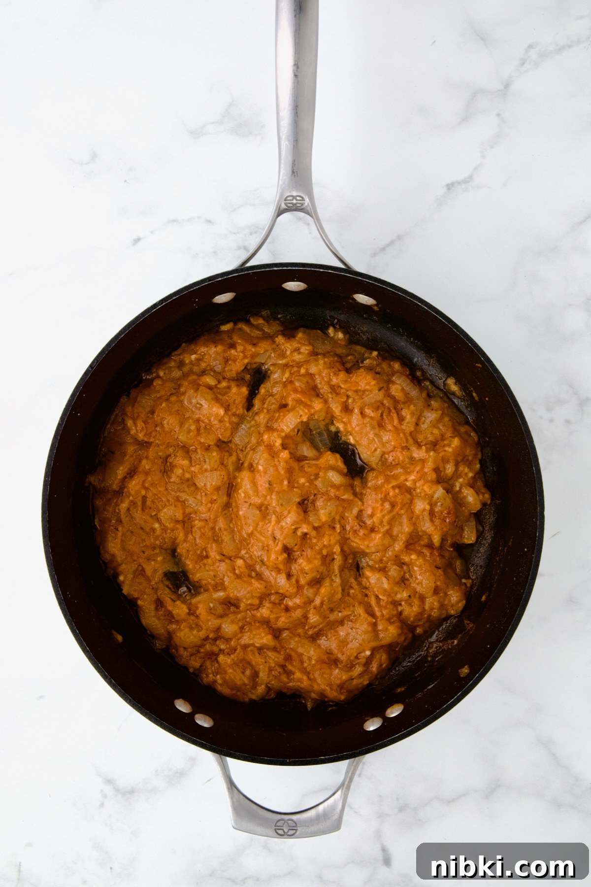 Oven-Baked Turkey Meatballs with Beer Glaze 13 Onions, tomato paste and flour in nonstick skillet.