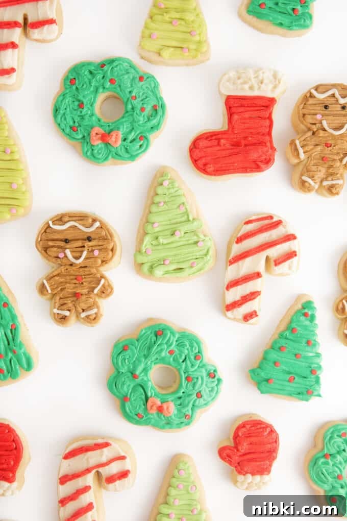 Christmas Cookie Frosting Recipes and Decorating Tips 12 Assortment of decorated Christmas sugar cookies; a wreath, stocking, gingerbread man, christmas tree